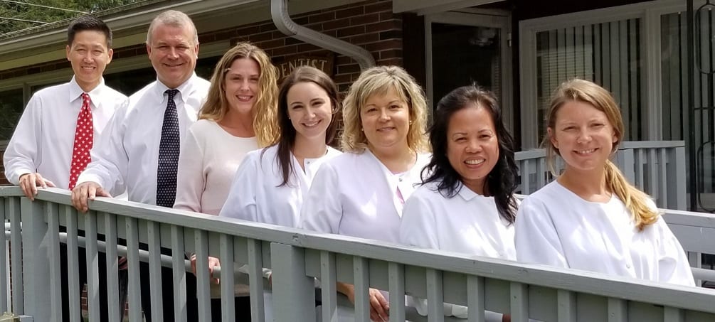 A group of women standing next to each other.