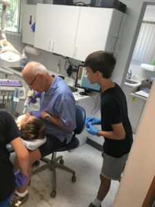 child watching a dentist work